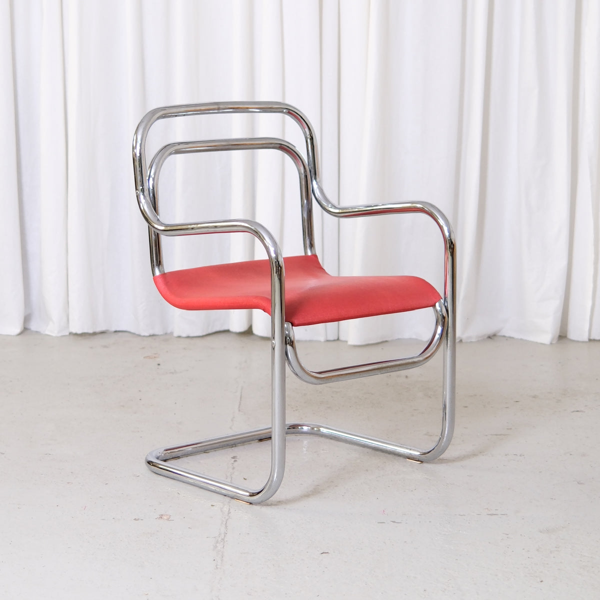 Rare vintage Esko Pajamies Juju chair for Lepo Finn with chrome tubular steel frame and red upholstered seat