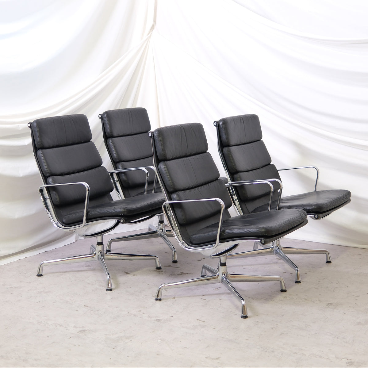 Vitra EA 215 lounge chair in black leather with polished aluminium frame