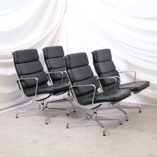 Vitra EA 215 lounge chair in black leather with polished aluminium frame