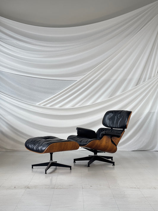 Eames Lounge Chair och Ottoman från Herman Miller i palisander och svart läder – USA, 1960-tal