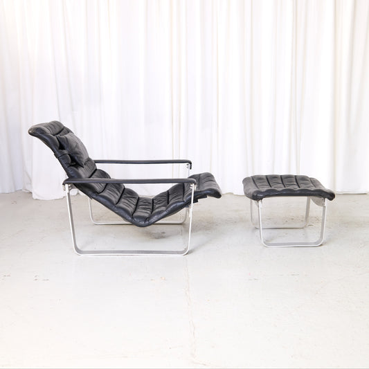 Ilmari Lappalainen Pulkka lounge chair with ottoman in black leather by Asko Export
