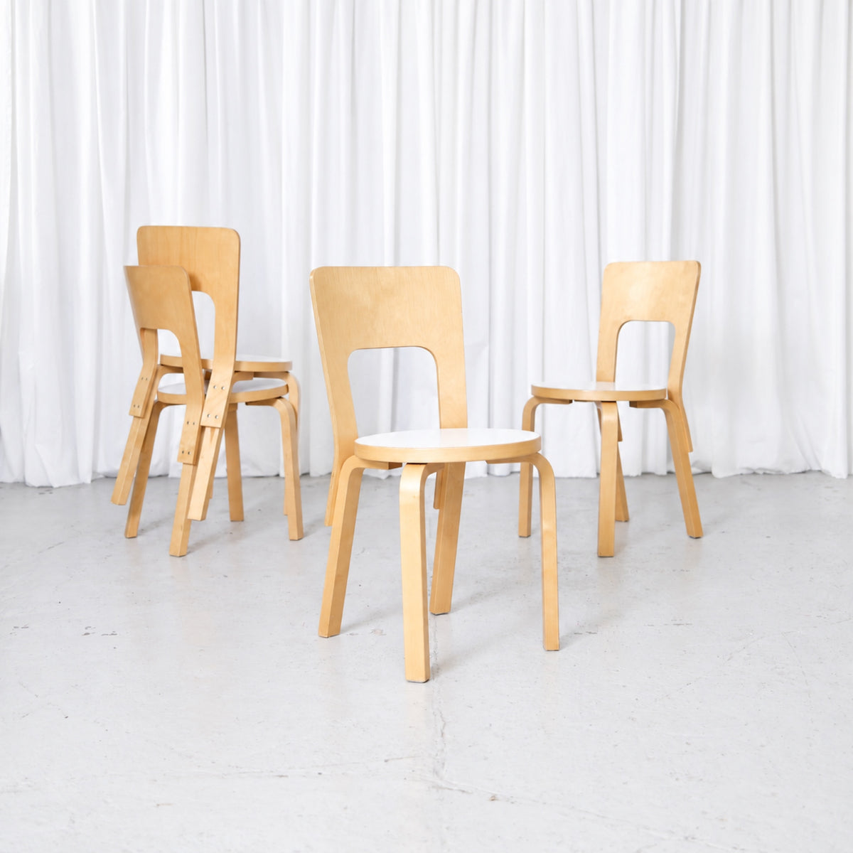 Set of four Artek Chair 66 chairs in birch with white laminate seats