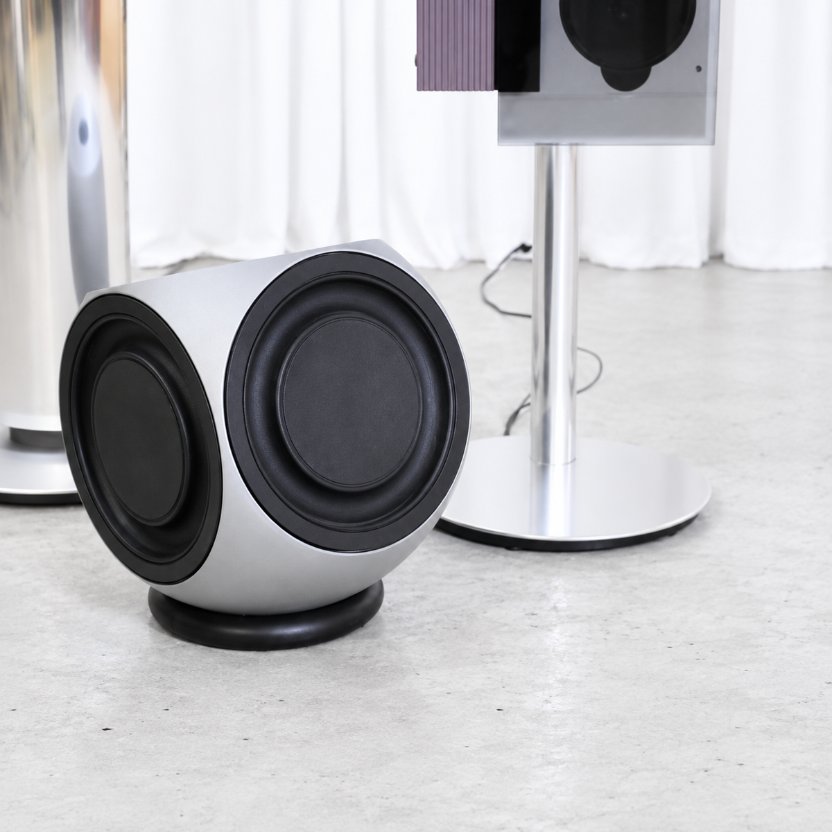 BeoLab 2 active subwoofer with BeoSound 9000 system in the background